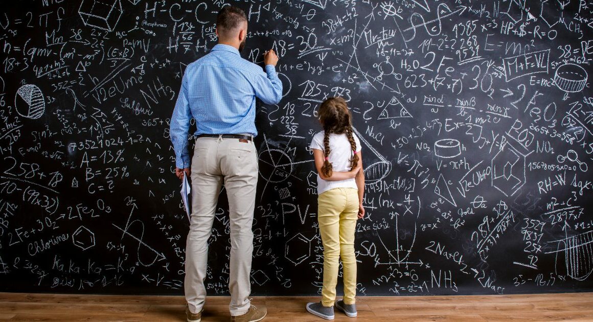 benefits automated essay grading teacher explaining ai to a student